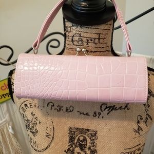 Cosmopolitan pink faux alligator purse